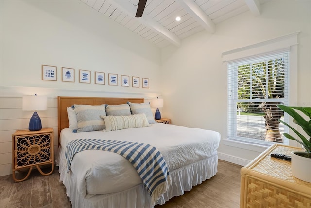 305 73rd St, Holmes Beach, FL 34217 - bedroom with a ceiling fan, wood finished floors, vaulted ceiling with beams, wooden ceiling, and baseboards