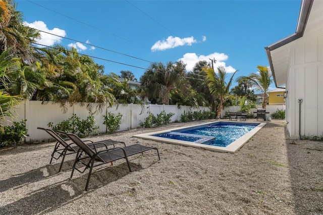 305 73rd St, Holmes Beach, FL 34217 - view of swimming pool featuring a fenced in pool, a fenced backyard, and a patio