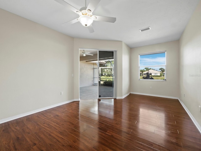 3835 Alamanda Dr, Sarasota, FL 34238 - empty room with ceiling fan, wood finished floors, and baseboards