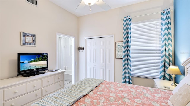 bedroom featuring visible vents and a closet