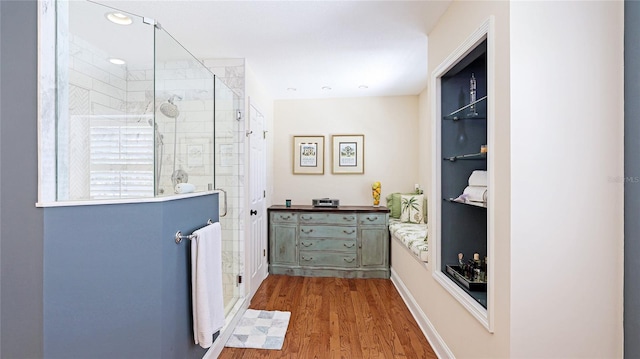 interior space with recessed lighting and wood finished floors