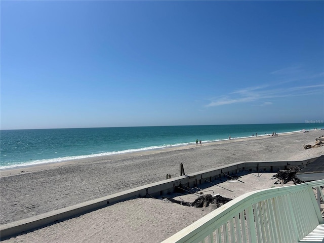 property view of water featuring a beach view