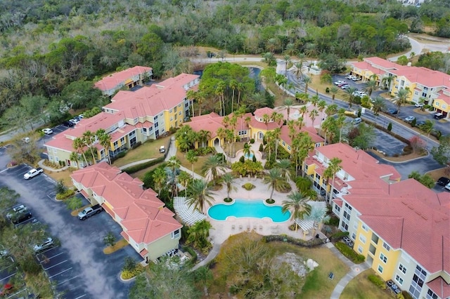 aerial view of property's location with a pool