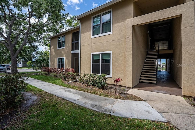 4061 Crockers Lake Blvd Unit 2618, Sarasota, FL 34238 - view of property featuring stairs