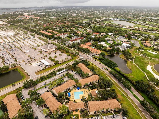 4061 Crockers Lake Blvd Unit 2618, Sarasota, FL 34238 - birds eye view of property featuring view of golf course, a water view, and a residential view