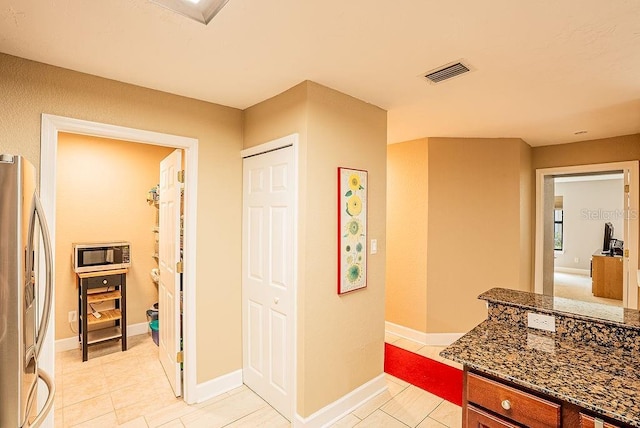 4061 Crockers Lake Blvd Unit 2618, Sarasota, FL 34238 - bathroom featuring baseboards, visible vents, and tile patterned flooring