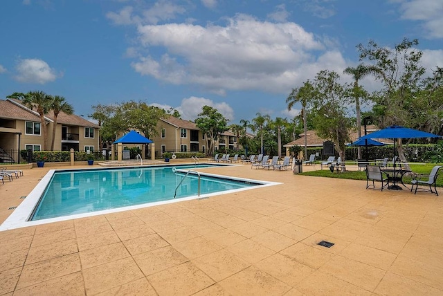 4061 Crockers Lake Blvd Unit 2618, Sarasota, FL 34238 - community pool with a patio area