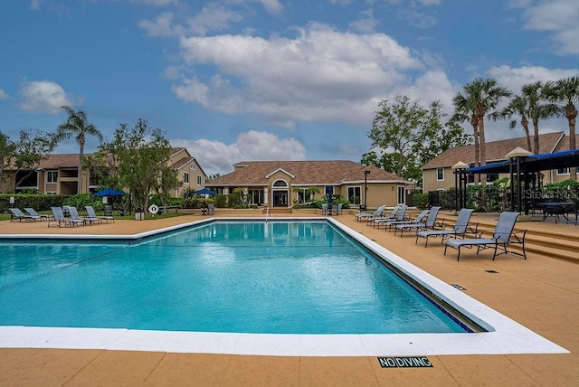 4061 Crockers Lake Blvd Unit 2618, Sarasota, FL 34238 - community pool featuring a patio area