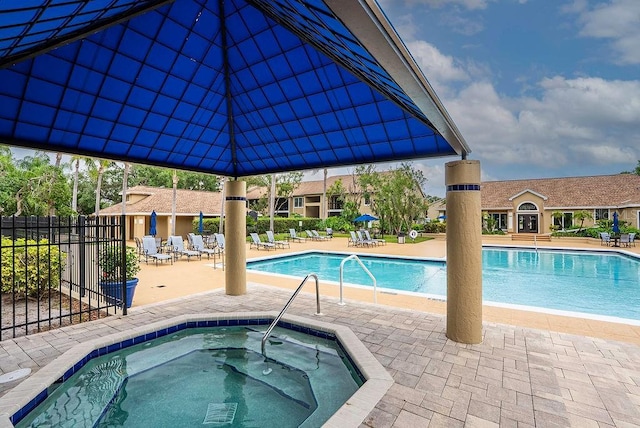 4061 Crockers Lake Blvd Unit 2618, Sarasota, FL 34238 - community pool with a patio area, a hot tub, and fence