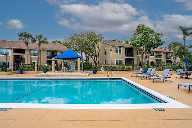 4061 Crockers Lake Blvd Unit 2618, Sarasota, FL 34238 - pool with fence and a patio