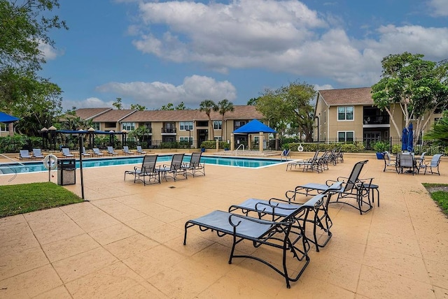 4061 Crockers Lake Blvd Unit 2618, Sarasota, FL 34238 - pool featuring fence and a patio