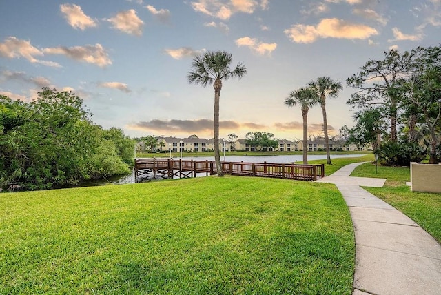 4061 Crockers Lake Blvd Unit 2618, Sarasota, FL 34238 - view of home's community featuring a lawn and a water view