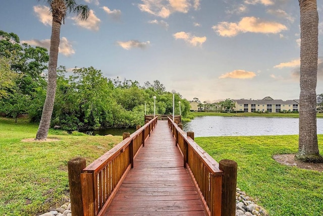 4061 Crockers Lake Blvd Unit 2618, Sarasota, FL 34238 - view of dock with a yard and a water view