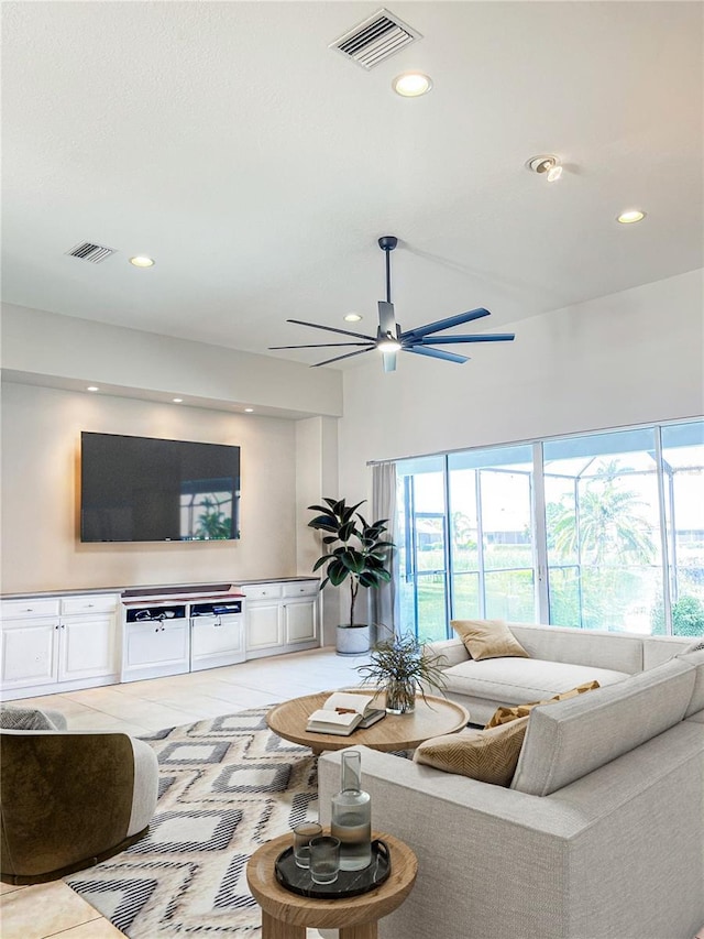 2980 Seasons Blvd, Sarasota, FL 34240 - living area with healthy amount of natural light, a ceiling fan, and recessed lighting