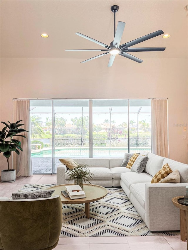 2980 Seasons Blvd, Sarasota, FL 34240 - living area with a ceiling fan, plenty of natural light, light tile patterned floors, and recessed lighting