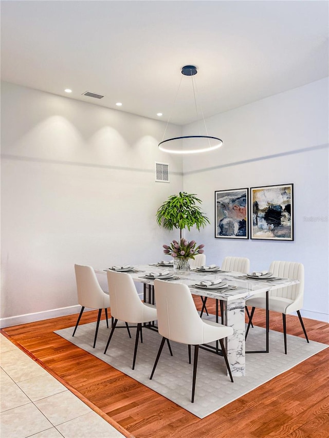 2980 Seasons Blvd, Sarasota, FL 34240 - dining area with baseboards, light wood finished floors, and recessed lighting