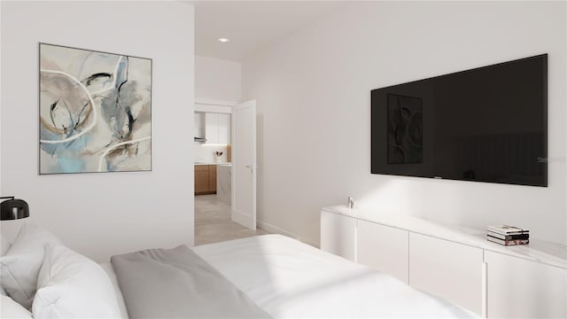 4950 Remington Dr Unit 304, Sarasota, FL 34234 - bedroom featuring ensuite bath and baseboards