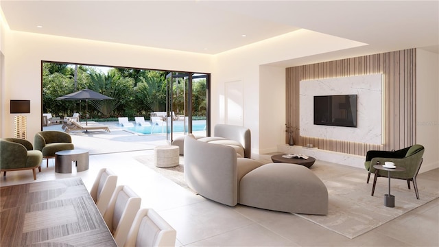 4950 Remington Dr Unit 304, Sarasota, FL 34234 - living area with tile patterned flooring, baseboards, and an accent wall