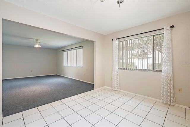 5521 Riverbluff Cir Unit V-10, Sarasota, FL 34231 - unfurnished room with ceiling fan, baseboards, and carpet floors