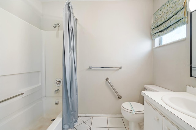 5521 Riverbluff Cir Unit V-10, Sarasota, FL 34231 - bathroom featuring vanity, toilet, shower / bath combo, tile patterned floors, and baseboards