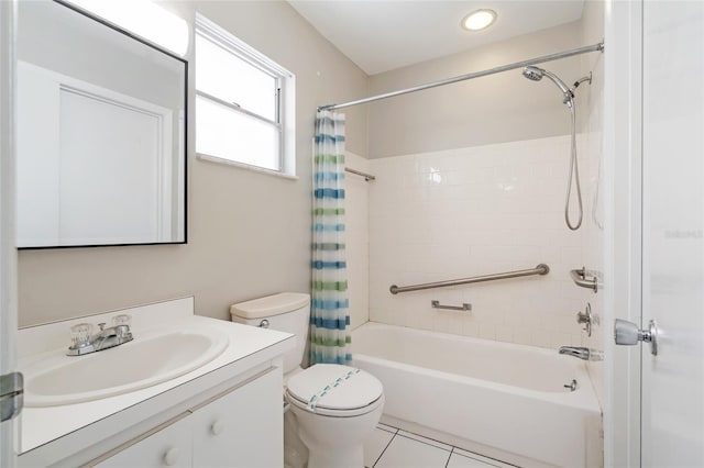 5521 Riverbluff Cir Unit V-10, Sarasota, FL 34231 - bathroom with shower / bath combo with shower curtain, vanity, toilet, and tile patterned floors