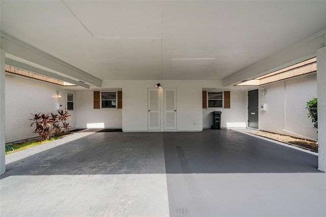 5521 Riverbluff Cir Unit V-10, Sarasota, FL 34231 - garage with an attached carport