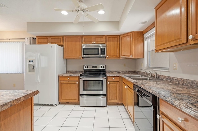 5521 Riverbluff Cir Unit V-10, Sarasota, FL 34231 - kitchen featuring appliances with stainless steel finishes, a sink, a ceiling fan, plenty of natural light, and recessed lighting