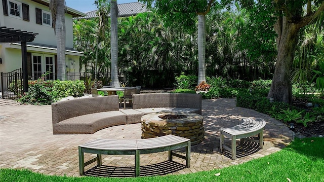 1435 Westway Dr, Sarasota, FL 34236 - view of patio featuring a fire pit, a pergola, and french doors