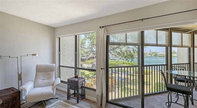 6157 Midnight Pass Rd Unit B42, Sarasota, FL 34242 - sunroom with a water view