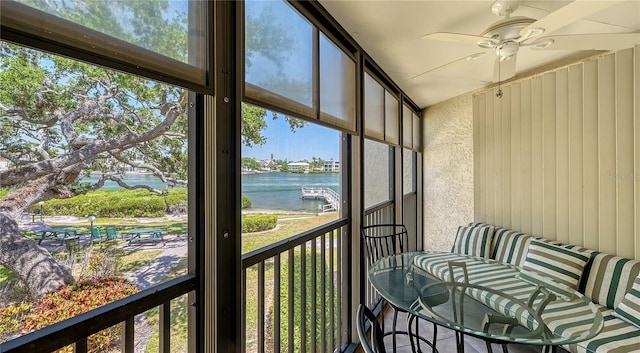 6157 Midnight Pass Rd Unit B42, Sarasota, FL 34242 - sunroom / solarium with a water view, ceiling fan, and a healthy amount of sunlight