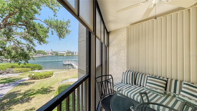 6157 Midnight Pass Rd Unit B42, Sarasota, FL 34242 - sunroom / solarium featuring a water view and ceiling fan