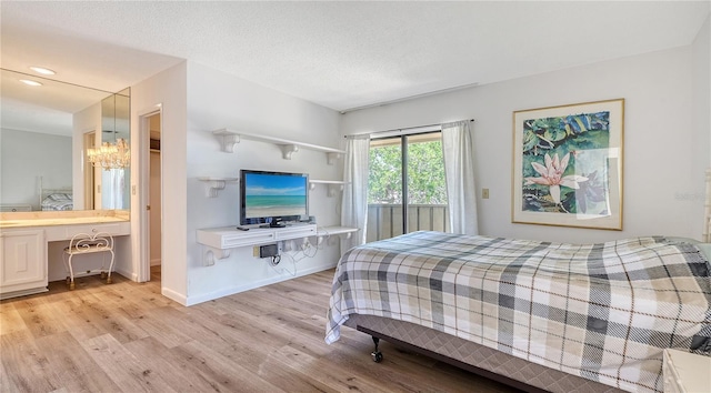 6157 Midnight Pass Rd Unit B42, Sarasota, FL 34242 - bedroom with light wood-type flooring, baseboards, recessed lighting, and a chandelier