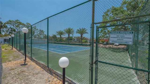 6157 Midnight Pass Rd Unit B42, Sarasota, FL 34242 - view of tennis court with fence