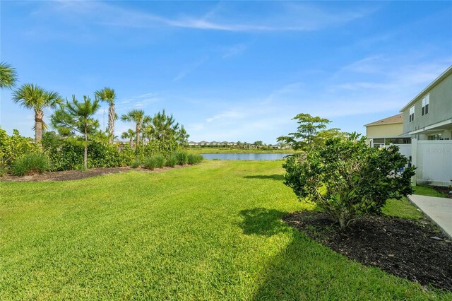 8596 Lunar Skye St, Sarasota, FL 34241 - view of yard featuring fence and a water view