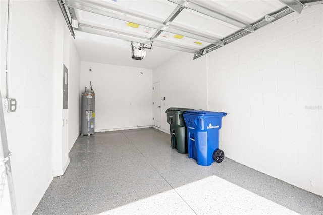 8596 Lunar Skye St, Sarasota, FL 34241 - garage featuring concrete block wall, electric water heater, and a garage door opener