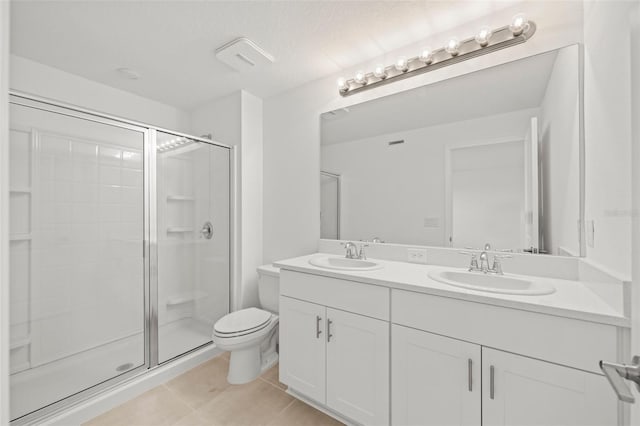 8596 Lunar Skye St, Sarasota, FL 34241 - bathroom featuring a shower stall, toilet, and a sink