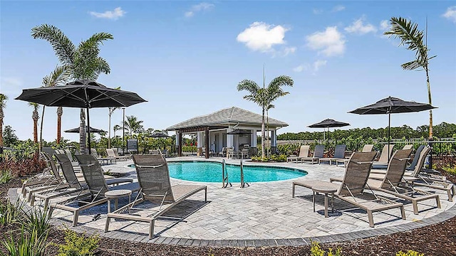 8596 Lunar Skye St, Sarasota, FL 34241 - pool featuring a patio area and fence