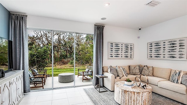 8596 Lunar Skye St, Sarasota, FL 34241 - tiled living area featuring visible vents