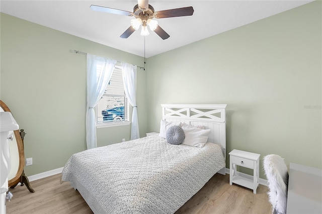 10806 52nd Ct E, Parrish, FL 34219 - bedroom with light wood-style floors and a ceiling fan