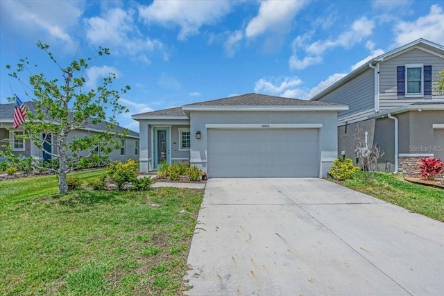 10616 High Noon Trl, Parrish, FL 34219 - ranch-style home featuring stucco siding, driveway, a front yard, and a garage