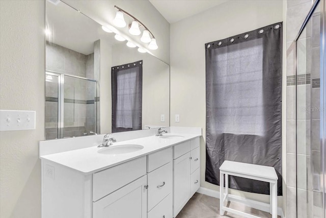 10616 High Noon Trl, Parrish, FL 34219 - full bath with double vanity, a shower stall, and a sink