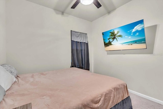 10616 High Noon Trl, Parrish, FL 34219 - carpeted bedroom with baseboards and ceiling fan