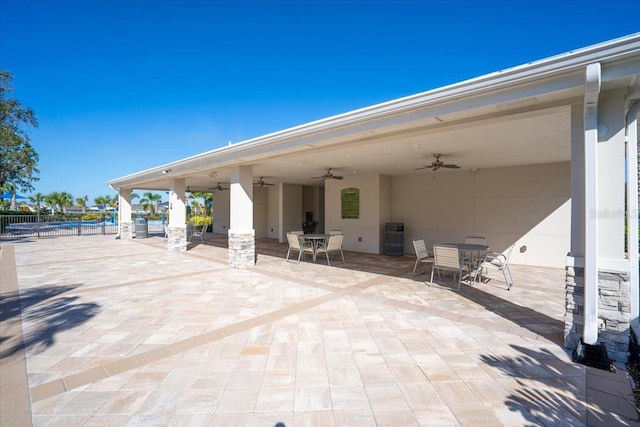 10616 High Noon Trl, Parrish, FL 34219 - view of patio / terrace with fence, outdoor dining area, and ceiling fan