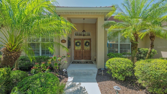5355 Anthony Ln, Sarasota, FL 34233 - property entrance with stucco siding