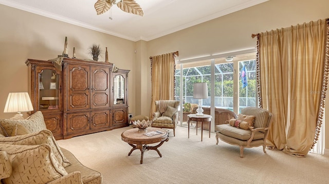 5355 Anthony Ln, Sarasota, FL 34233 - living area with carpet flooring, ornamental molding, and a ceiling fan