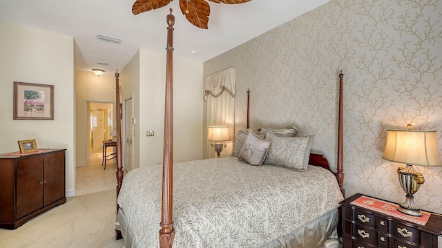 5355 Anthony Ln, Sarasota, FL 34233 - bedroom featuring light carpet, wallpapered walls, and ceiling fan