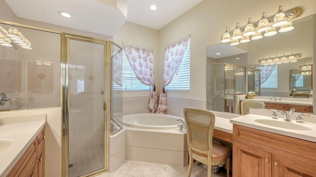 5355 Anthony Ln, Sarasota, FL 34233 - full bath with a stall shower, tile patterned flooring, a garden tub, two vanities, and recessed lighting