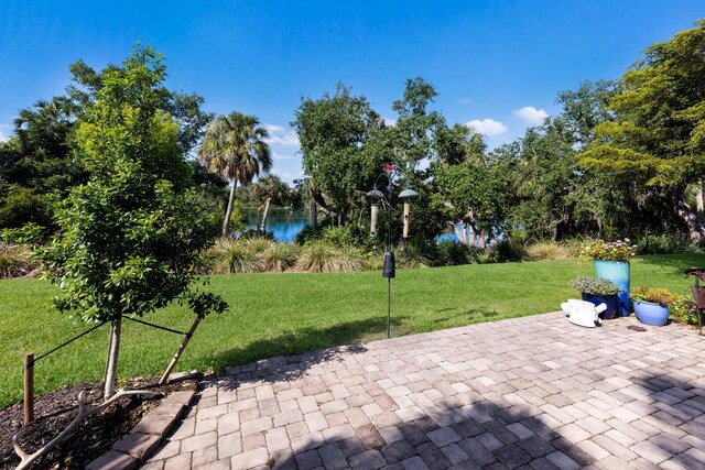 2397 Vaccaro Dr, Sarasota, FL 34231 - view of patio / terrace with a water view
