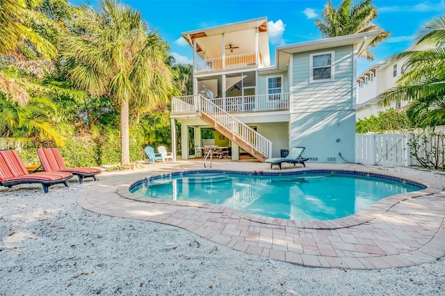 426 Magnolia Ave, Anna Maria, FL 34216 - view of swimming pool featuring a fenced in pool, fence, stairs, ceiling fan, and a patio