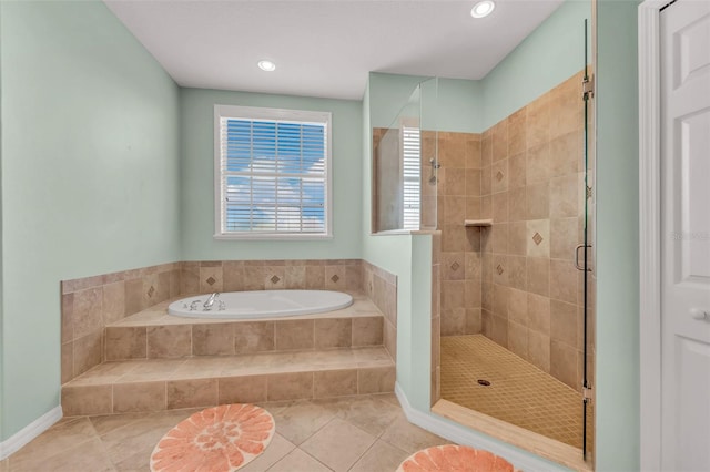 426 Magnolia Ave, Anna Maria, FL 34216 - bathroom featuring a bath, tile patterned flooring, a shower stall, and recessed lighting